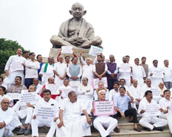 Cong protests, slams ED bid to pressurise officer to name K