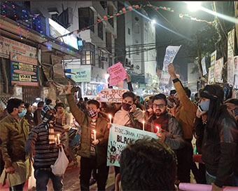 A group of protesters organised a candle light march in Jamia Nagar