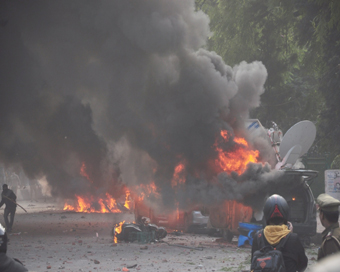 Lucknow: Angry protesters went on rampage and set ablaze vehicles during their protest against the Citizenship Amendment Act (CAA) 2019, in Lucknow on Dec 19, 2019. Violence erupted during protests against CAA on Thursday afternoon in various cities 