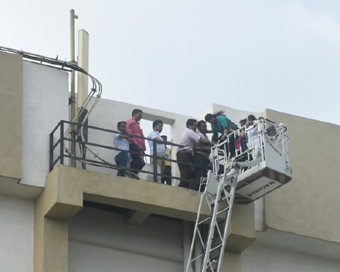 Mumbai: Rescue operations underway at the Mahanagar Telephone Nagar Ltd. (MTNL) Bandra building where a massive fire broke out, in Mumbai on July 22, 2019. Around 100 people are feared trapped after fire engulfed the building. The blaze erupted at ar