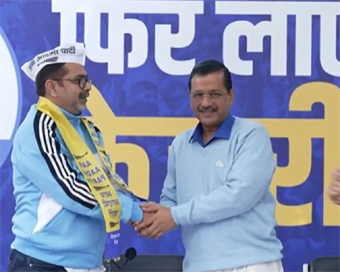 Kejriwal vows education revolution as UPSC coach Avadh Ojha joins AAP