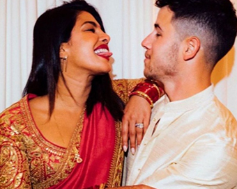 Priyanka-Nick look deeply in love in Karwa Chauth photos