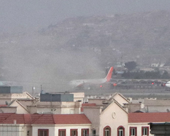 Suicide blasts rock Kabul airport, at least 60 dead (PHOTOS)